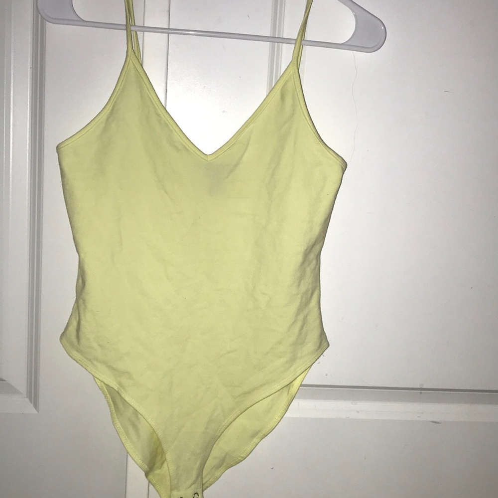 Yellow body suit
